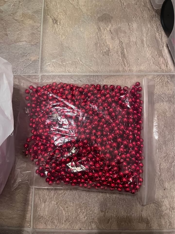 Beautiful red Christmas ornaments and red garland - photo 2