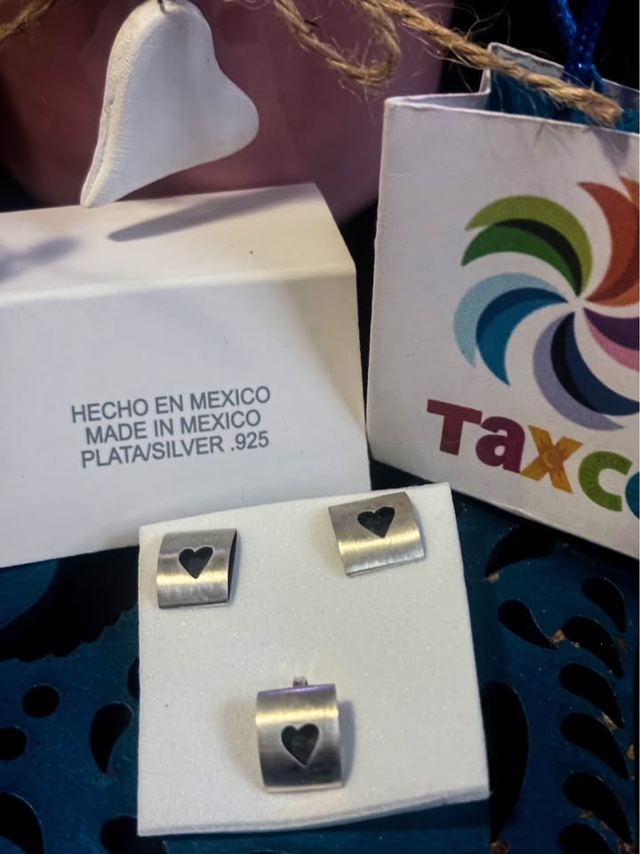 Set of silver earrings and pendant