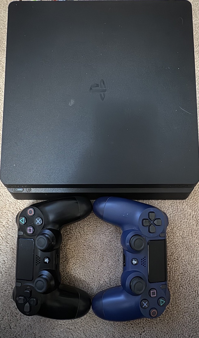 PlayStation 4 with 2 Controllers & 2 Games