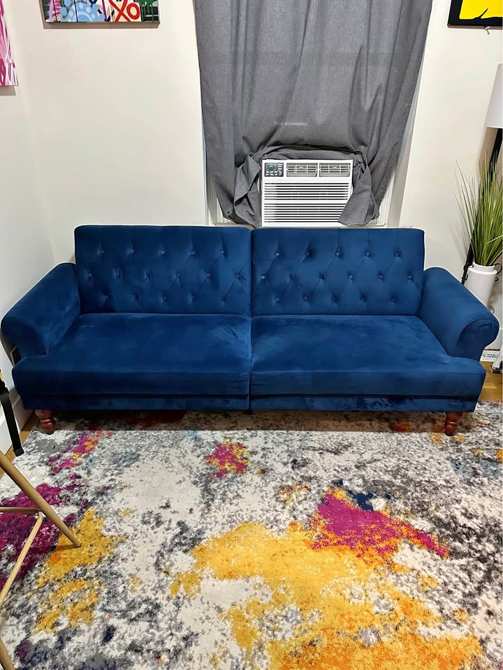 Upholstered blush velvet blue futon
