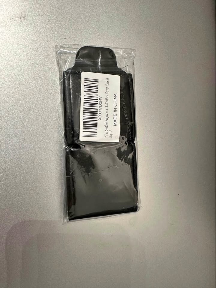 Seat belt adjuster cover