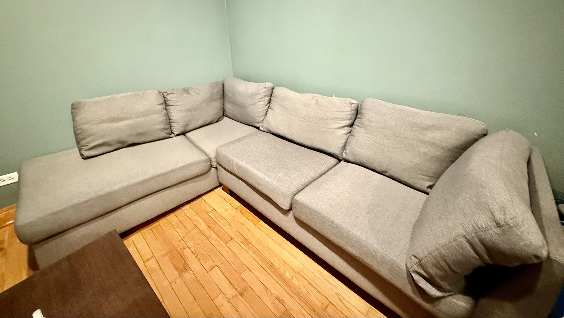 Upholstered Sectional + Ottoman