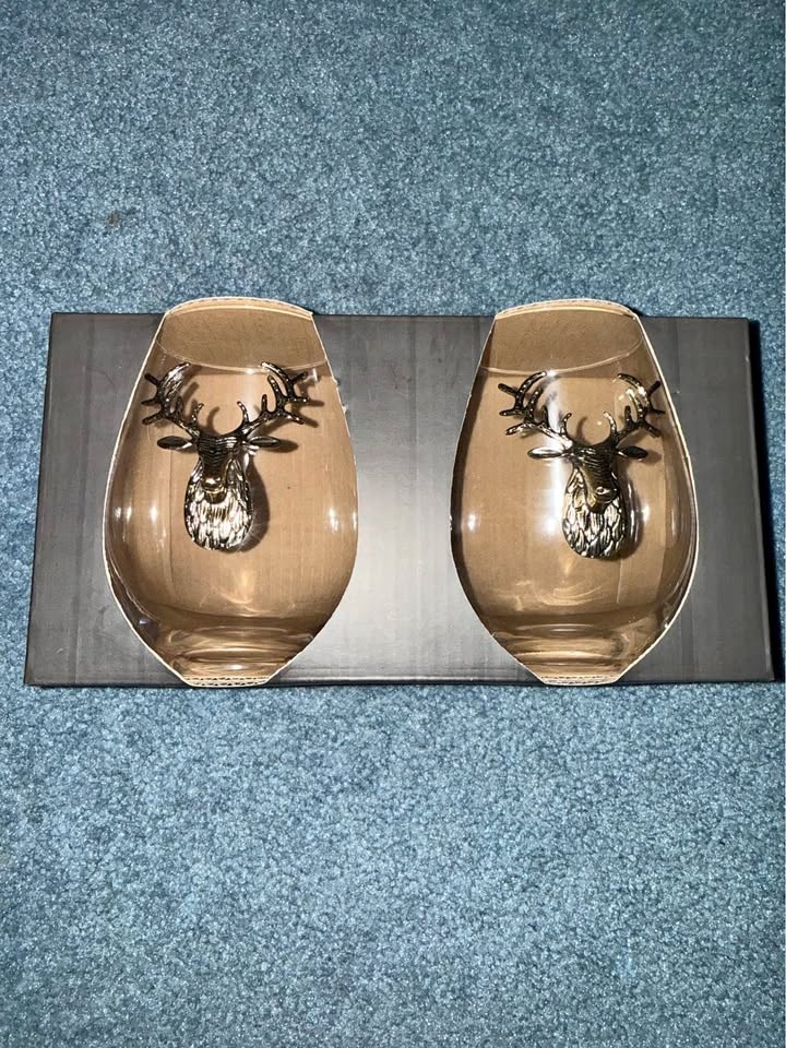 Stemless wine glasses with the deer emblem by Colin + Justin
