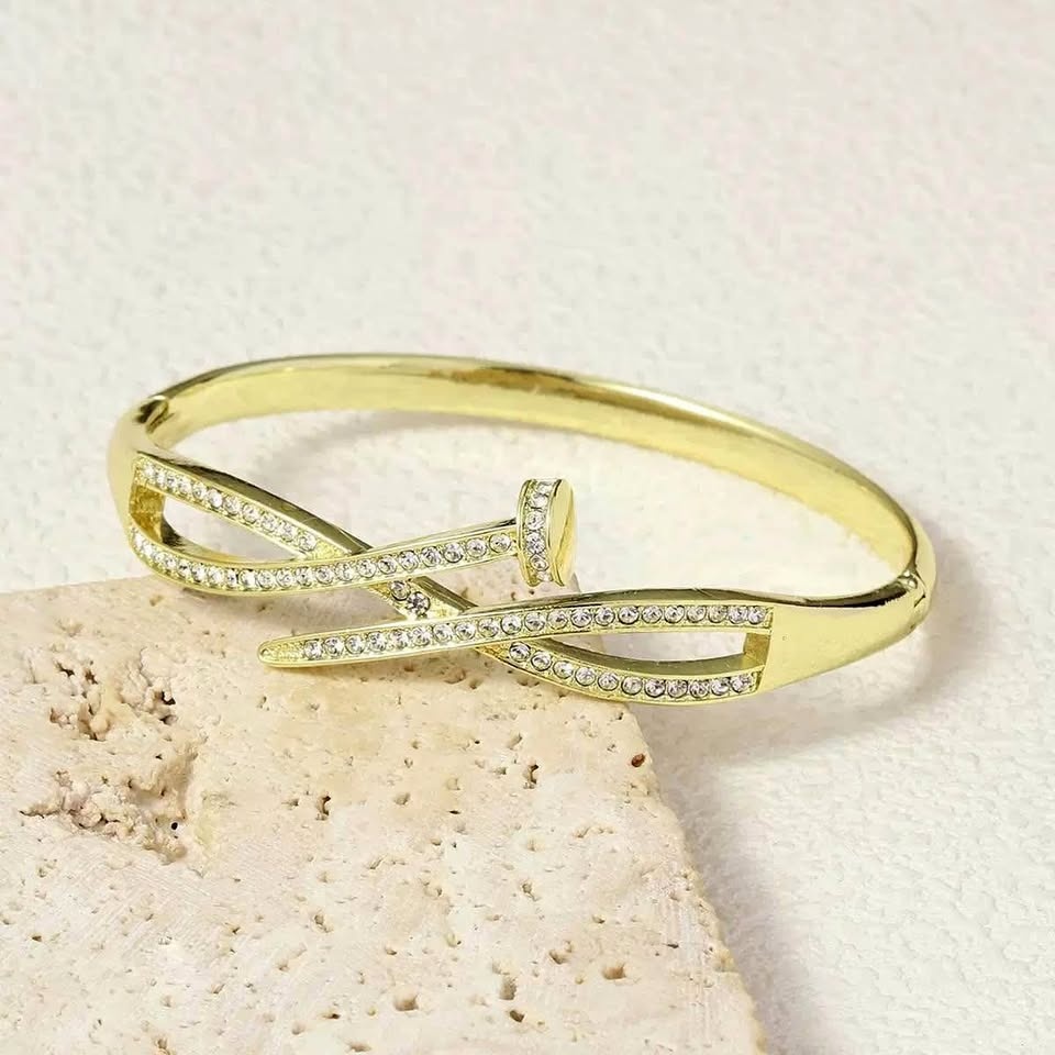 Gold-plated cuff nail bracelet with crystal