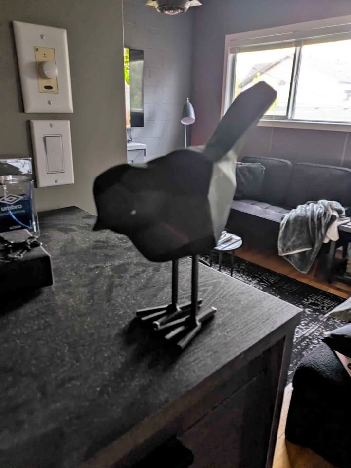 Black ceramic bird