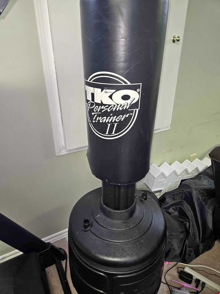 TKO freestanding punching bag and gloves