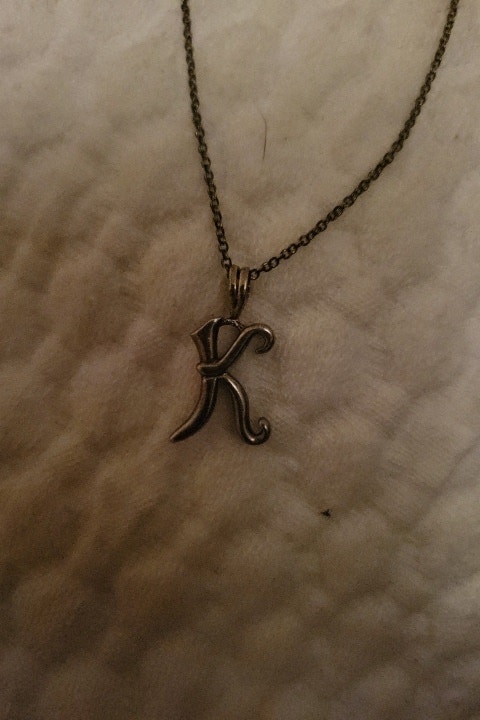 silver k charm necklace