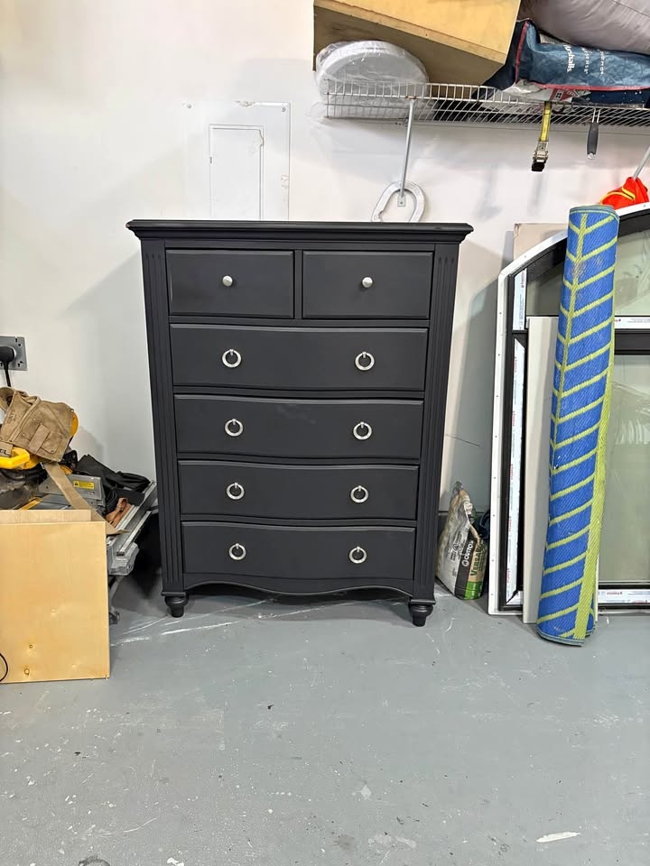 Beautiful black upright tall boy storage chest with silver handl
