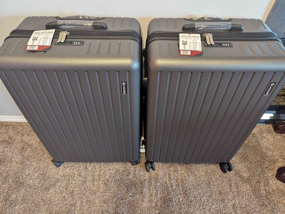 Brand new large checked in 28 in $75 each