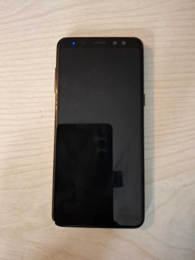 SAMSUNG A8 CELL PHONE
