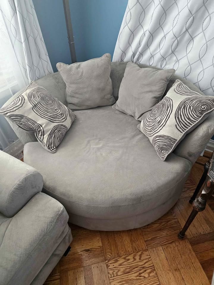 Gray Round Sofa with Pillows