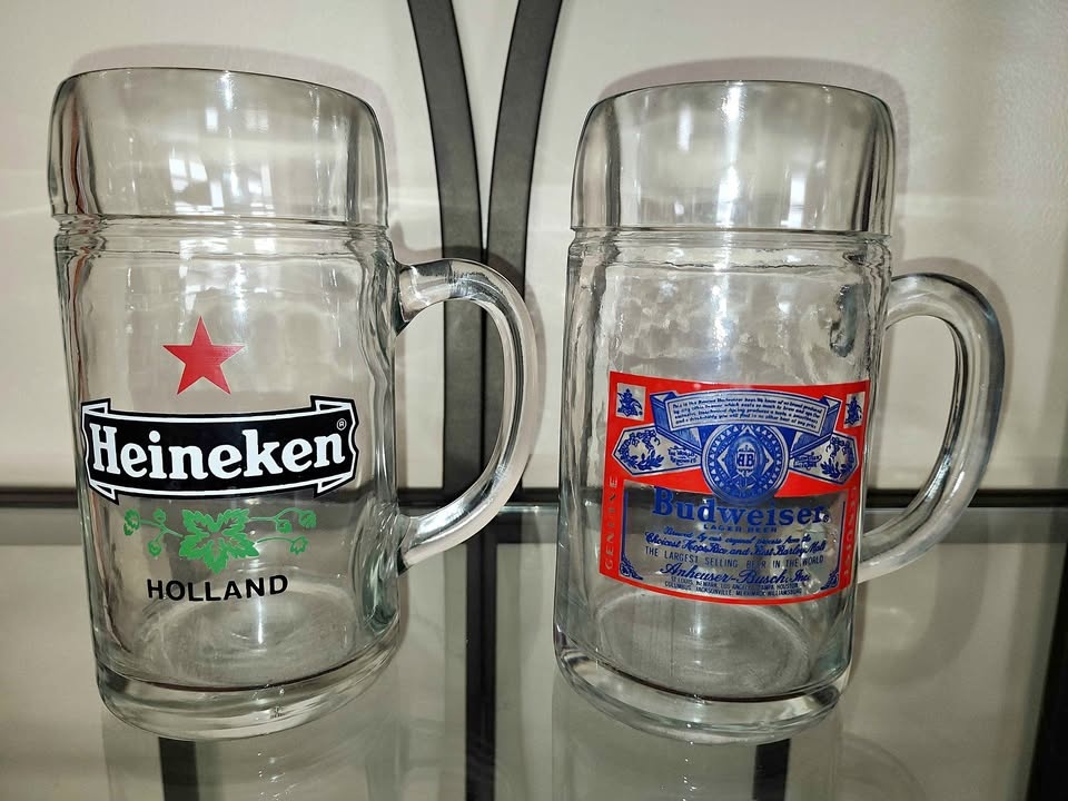 Vintage Heineken and Vintage Budweiser glass beer steins