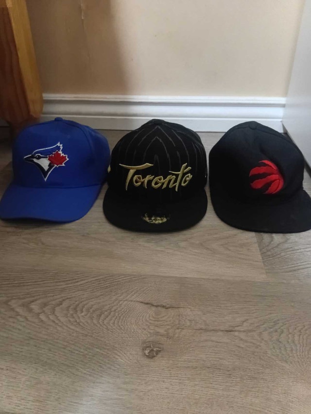 Baseball and basketball hats pre owned