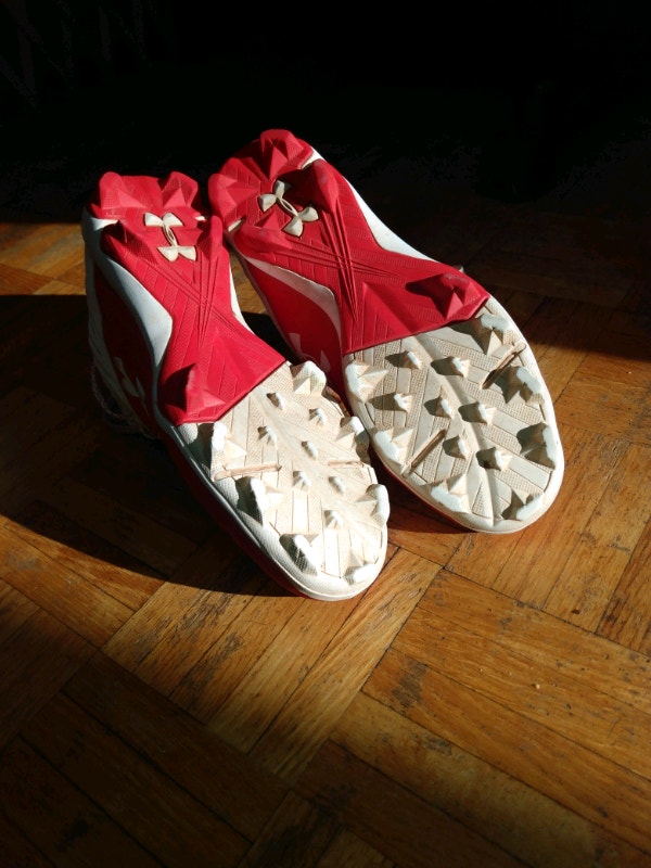 Red UnderArmour baseball cleats mid - photo 5