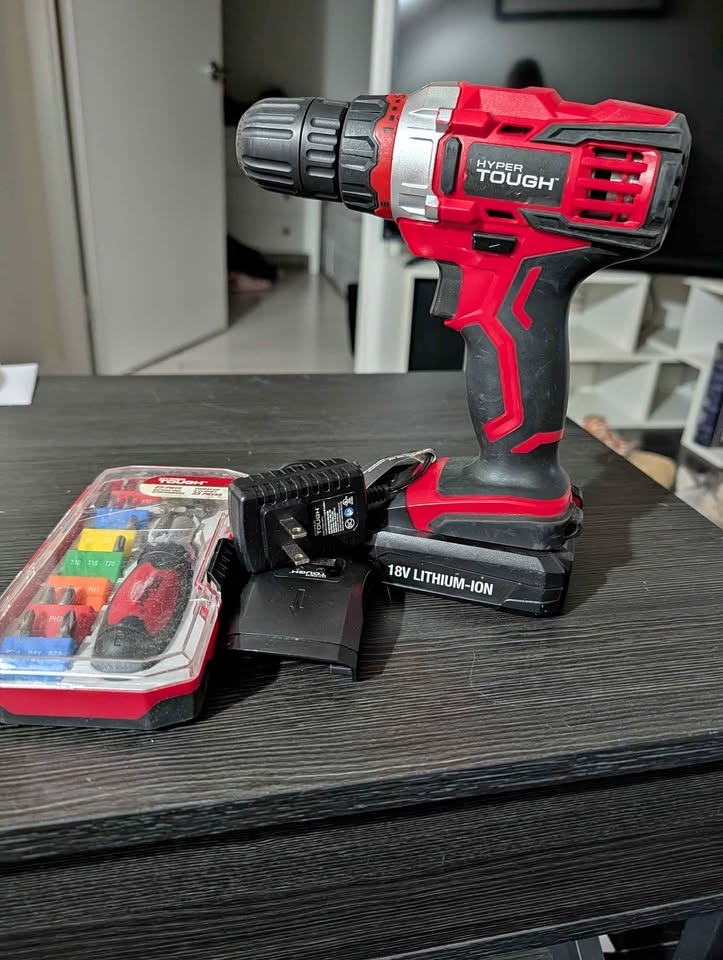 Drill with charger + screw driving kit (2 flathead bits missing)