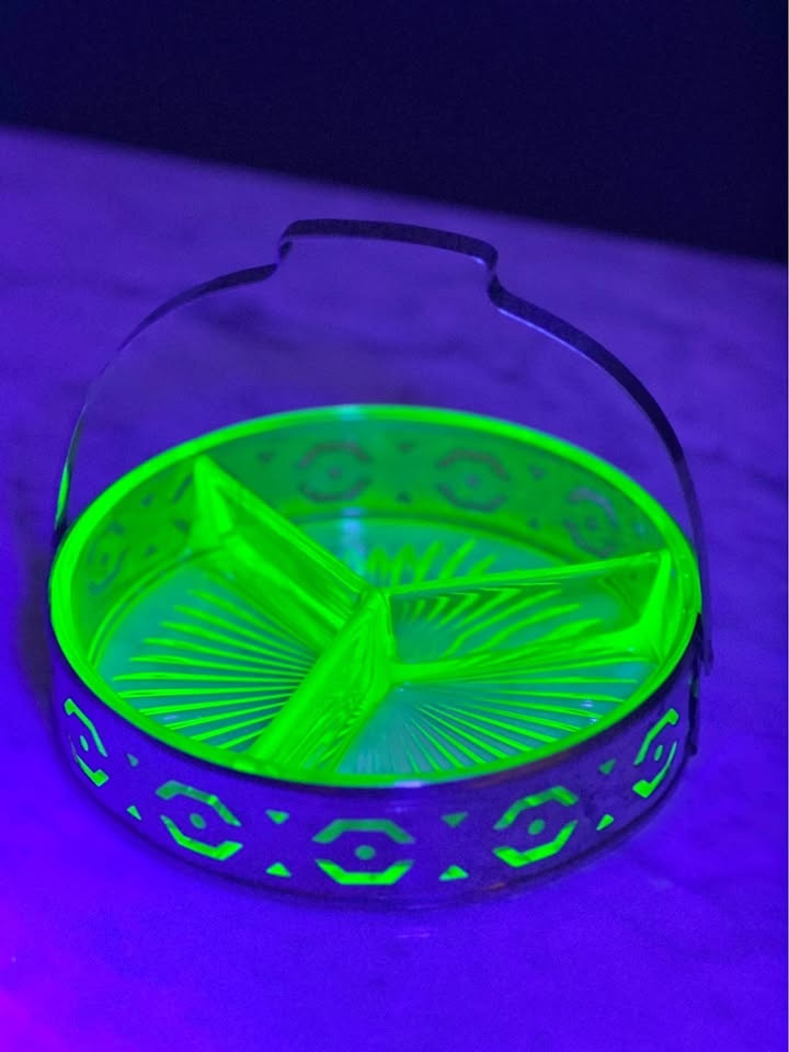Vintage uranium glass dish in a metal basket