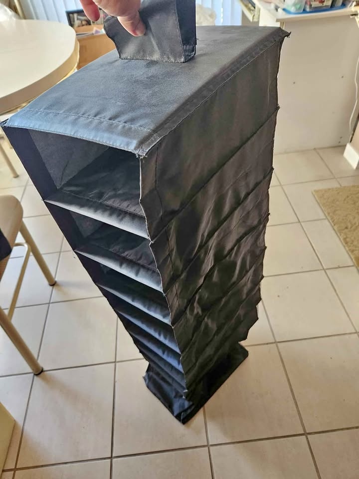 Shoe Storage. Expands to 48". 13"D x 9" W x 5". 9 Compartments