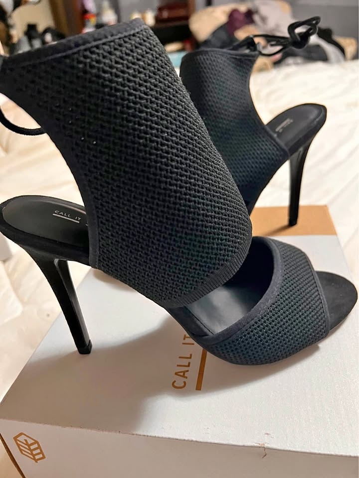 Black stretch high heels
