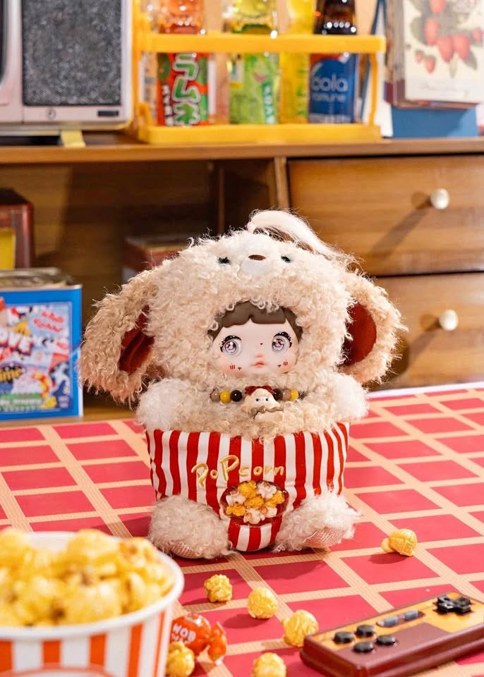 Nommi About the Childhood Plush Pendant - Puppy Popcorn