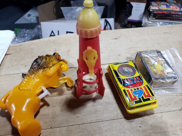 4 Vintage Toys Cap Rocket Jimmy Tin Car Puzzle Lion Water pistol