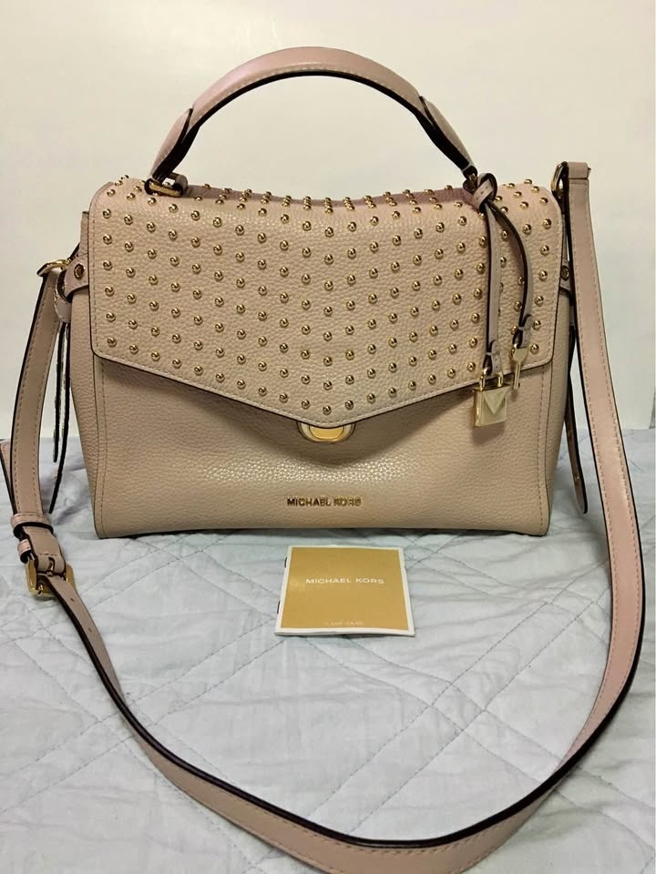 Michael kors soft pink studded handbag