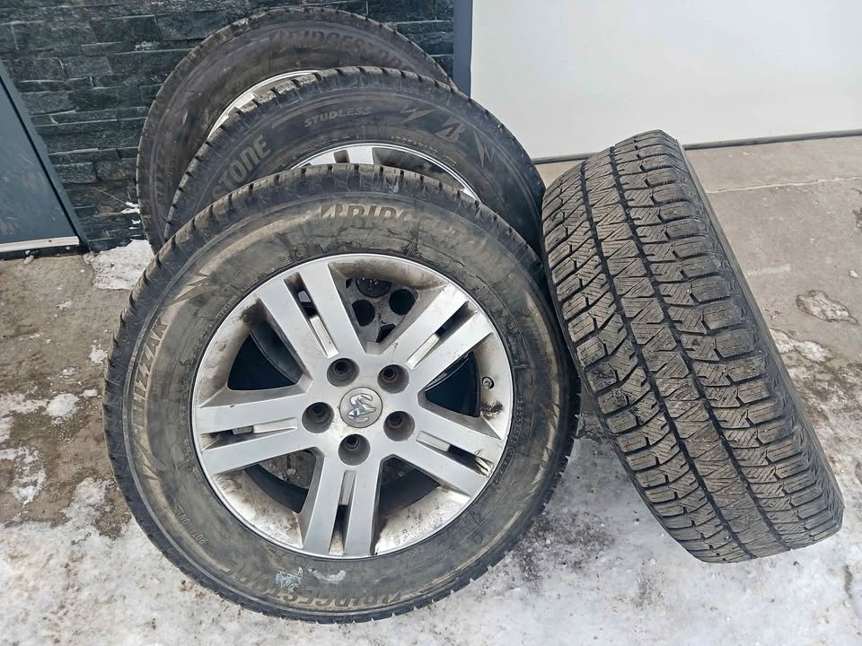 235 60 r17 BRIDGESTONE BLIZZAK TIRES on DODGE RIMS