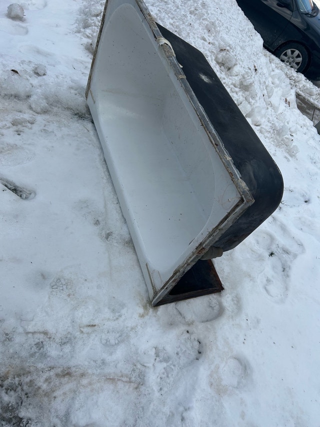 Scrap metal bathtub
