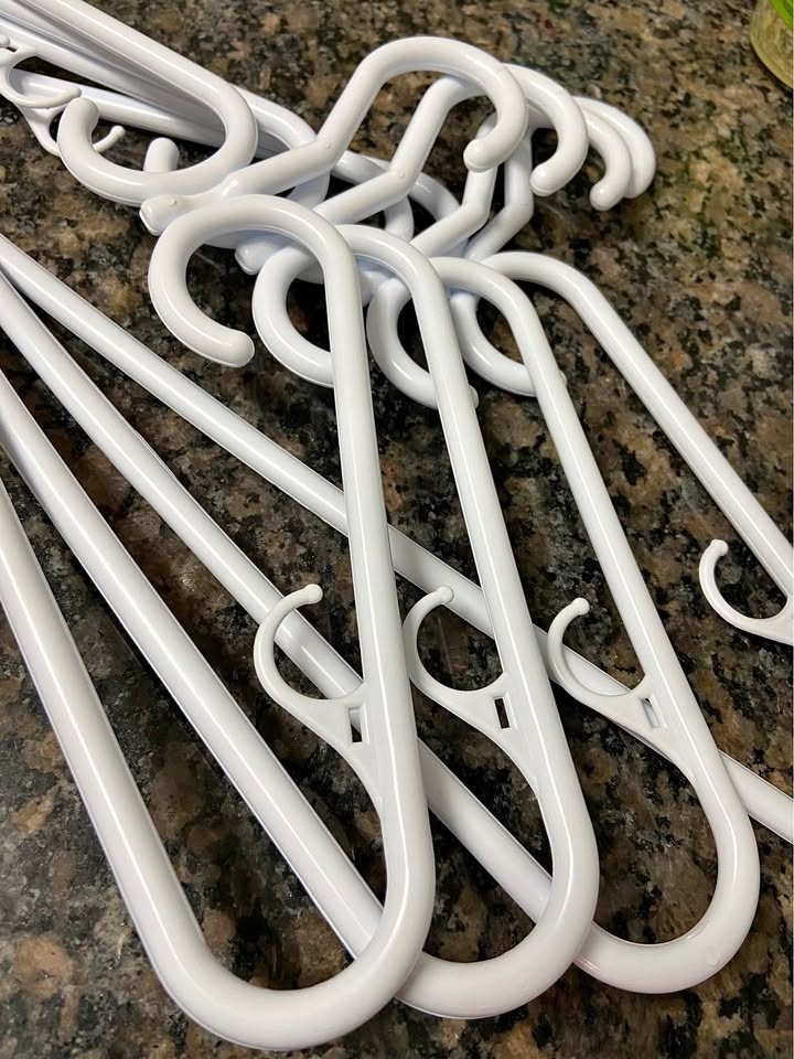 19 White Plastic Hangers – Adult Size