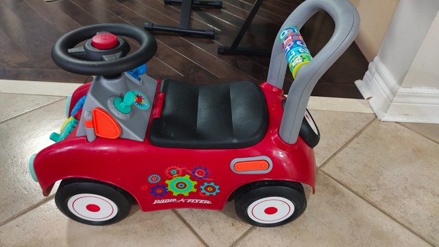 Radio Flyer Busy Buggy, Sit to Stand Toddler Ride On, Ages 1-3