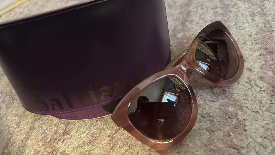 John Galliano sunglasses in case. Very lightly used. thumbnail