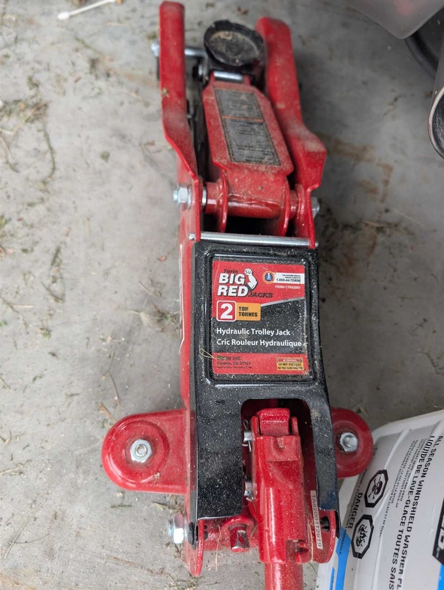 big red hydraulic floor jack