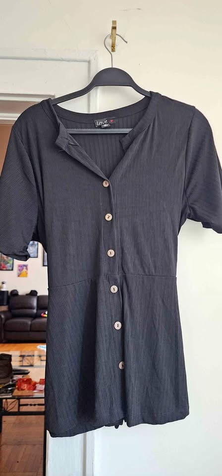 Women's black sleeved knit top