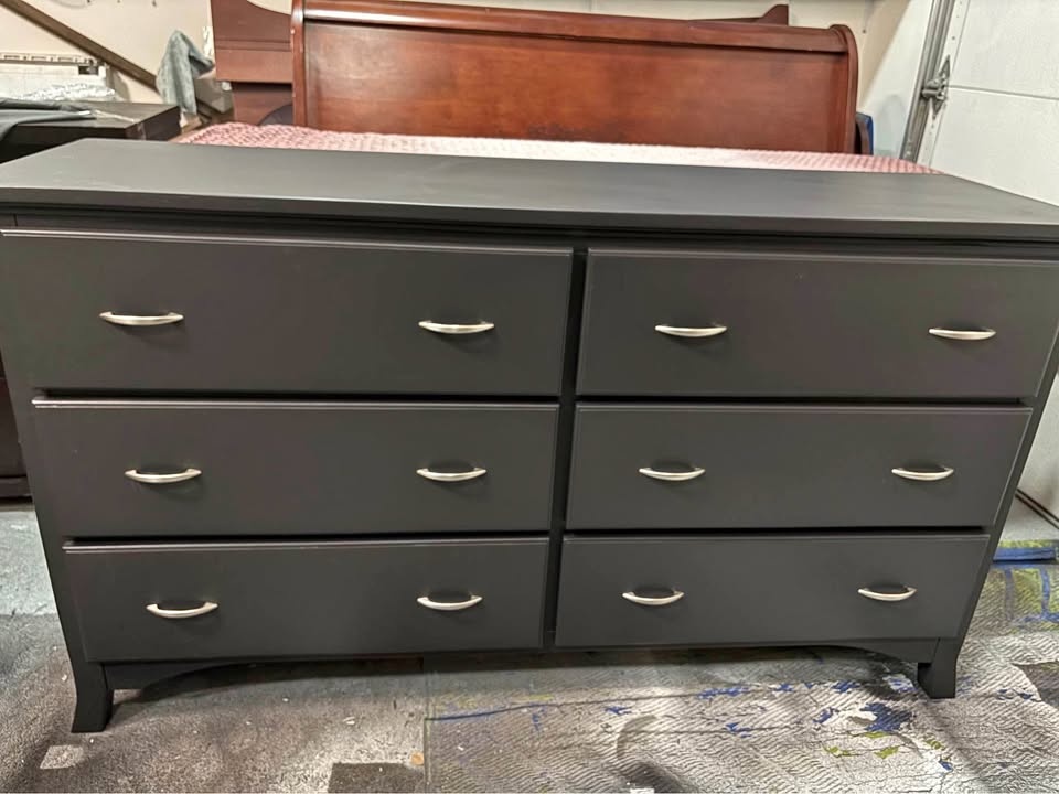 Beautiful black storage dresser with silver handles - like new