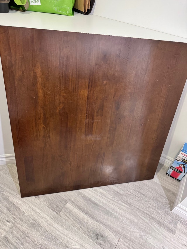 Wooden 4 chaired Dining set.