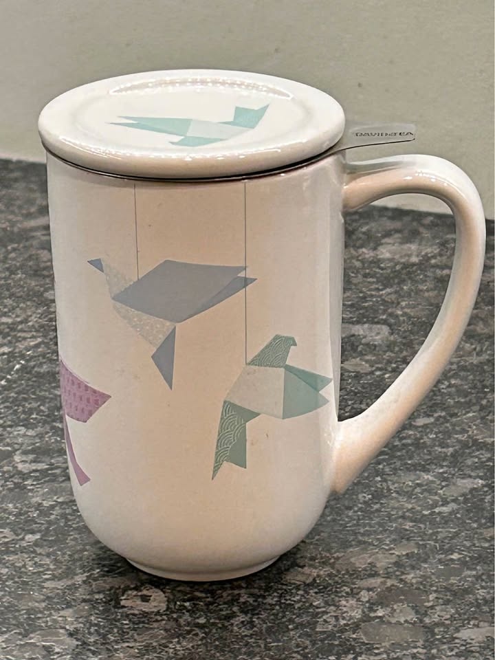 DAVIDsTEA Nordic tea mug with an origami bird mobile pattern
