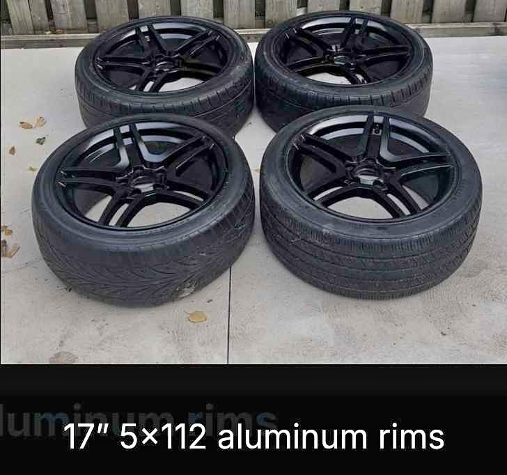 Four 17” 5x112 aluminum rims