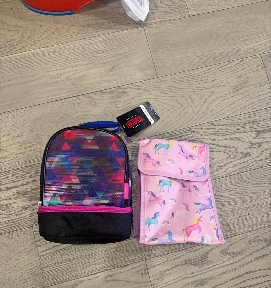 Two girls school lunchboxes
