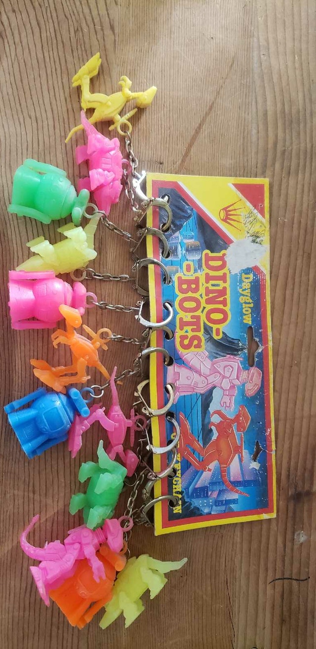 12 New Vintage Keyring Dayglow DINOSAURES Keychain Hong Kong