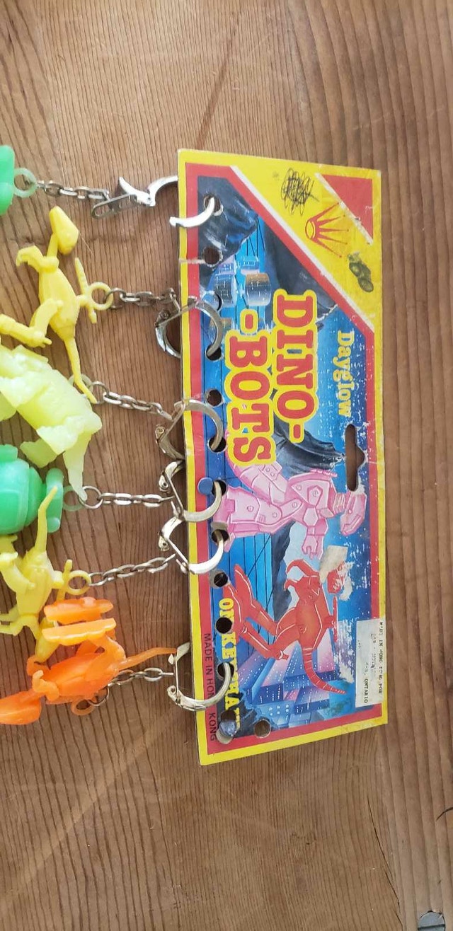 Vintage Dayglow DINOSAURE Keychain Hong Kong Display