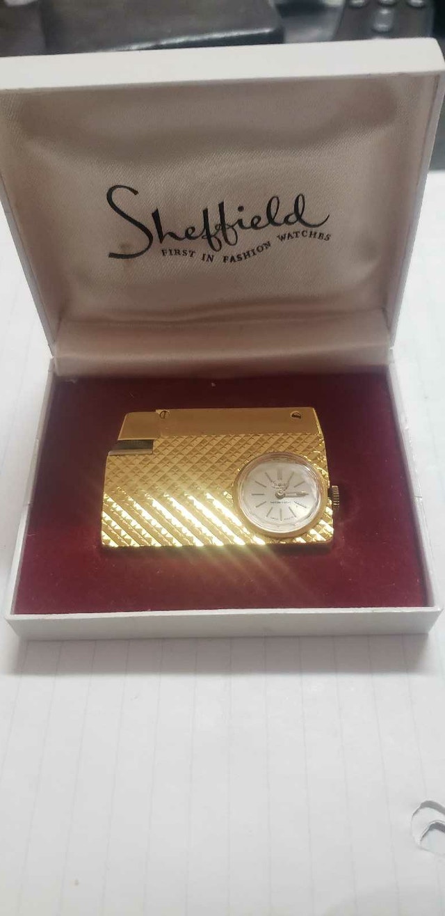 VINTAGE WINDUP CLOCK SHEFFILD BUTANE GOLD LIGHTER