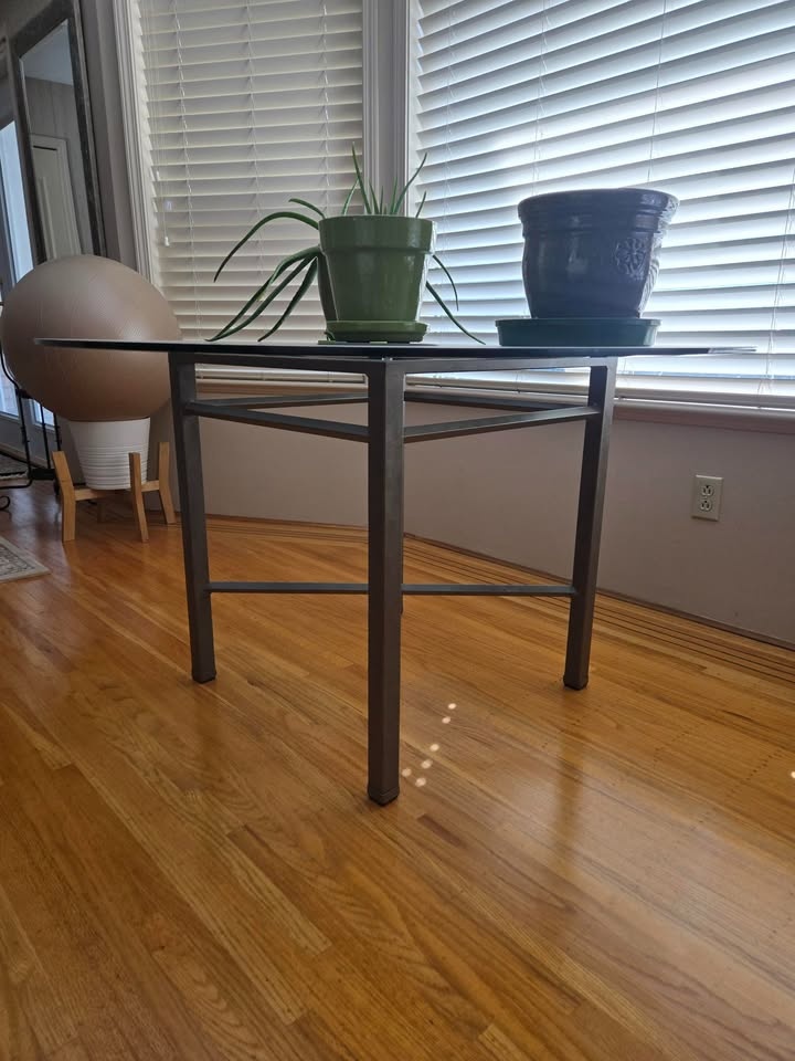 Glass rounded dining table with steel base - photo 2