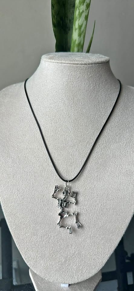 Dancing skeleton charm necklace