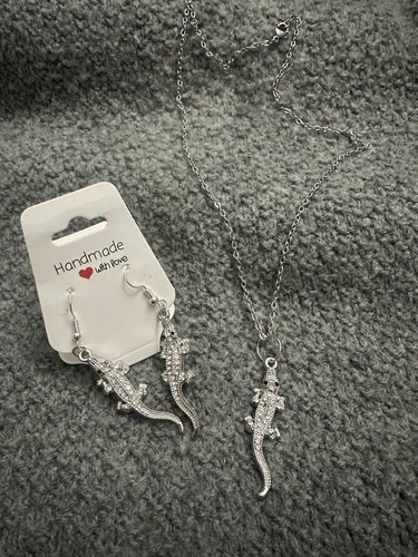 pair of fashion silver-tone alligator dangle earrings with neckl