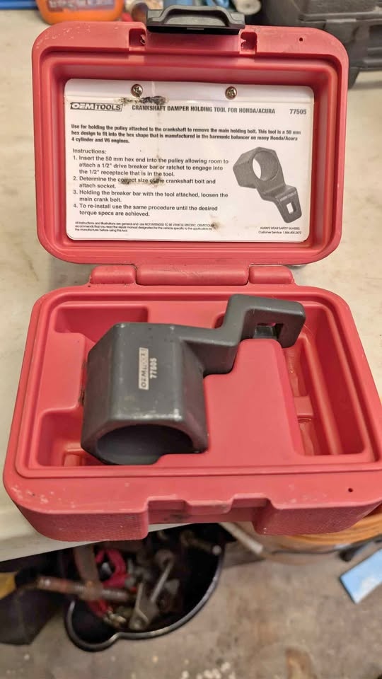 Crankshaft damper holding tool