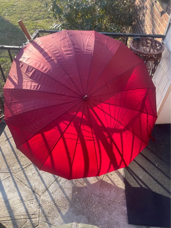 Two oversized umbrellas with wooden handles. - photo 2