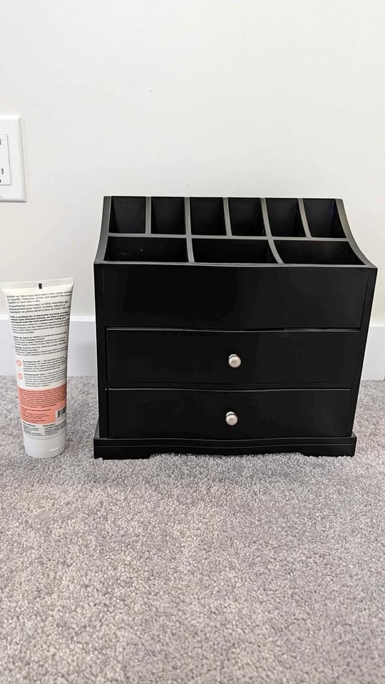 black wooden desk or makeup organizer