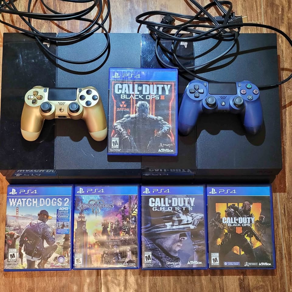PS4 With Controllers and GAMES