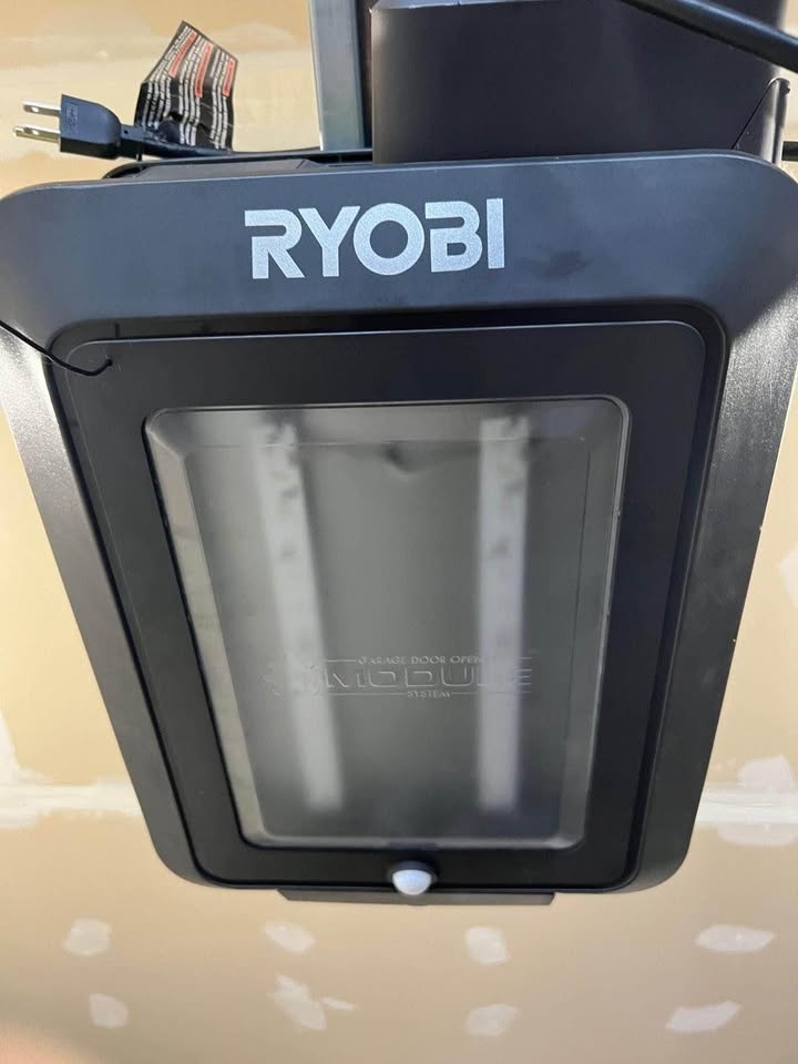 Ryobi garage door opener with two remotes door sensors etc