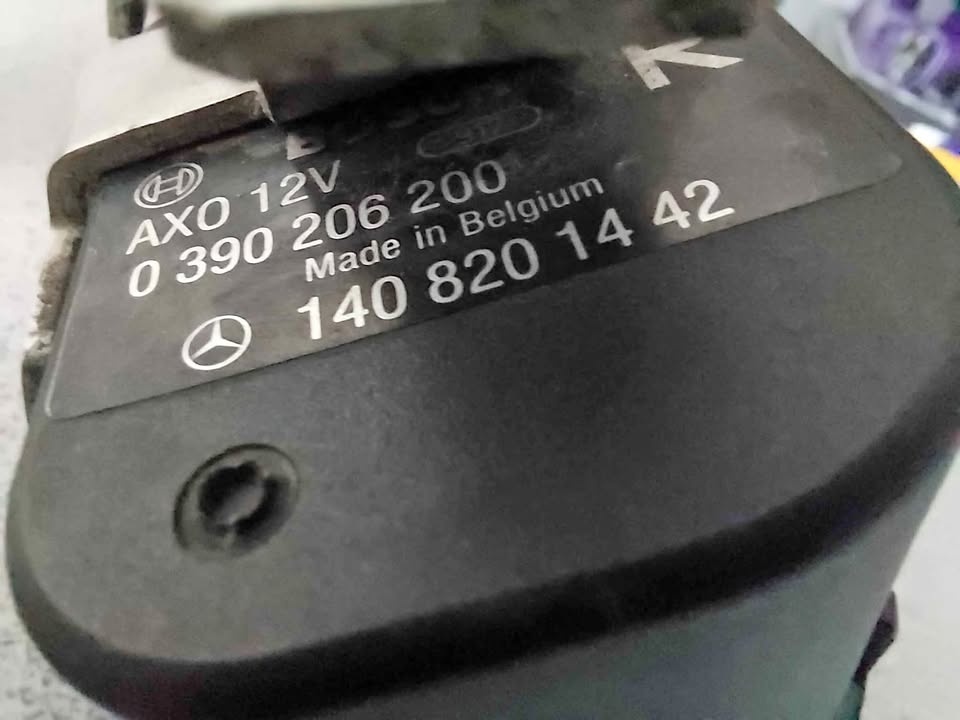 Mercedes A1408201442 headlight washer motor.