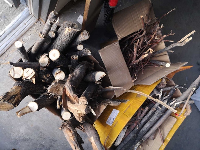 tree branches cut for fire place （boxes of fire wood) - photo 2